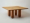 Square dining table with chunky solid pine legs reminiscent of Brazilian modernism