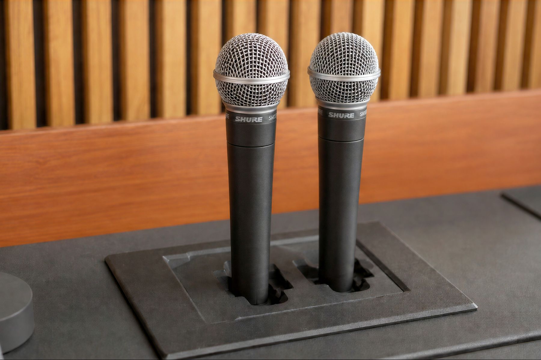 Wireless microphone and charging dock reference for lectern inserts