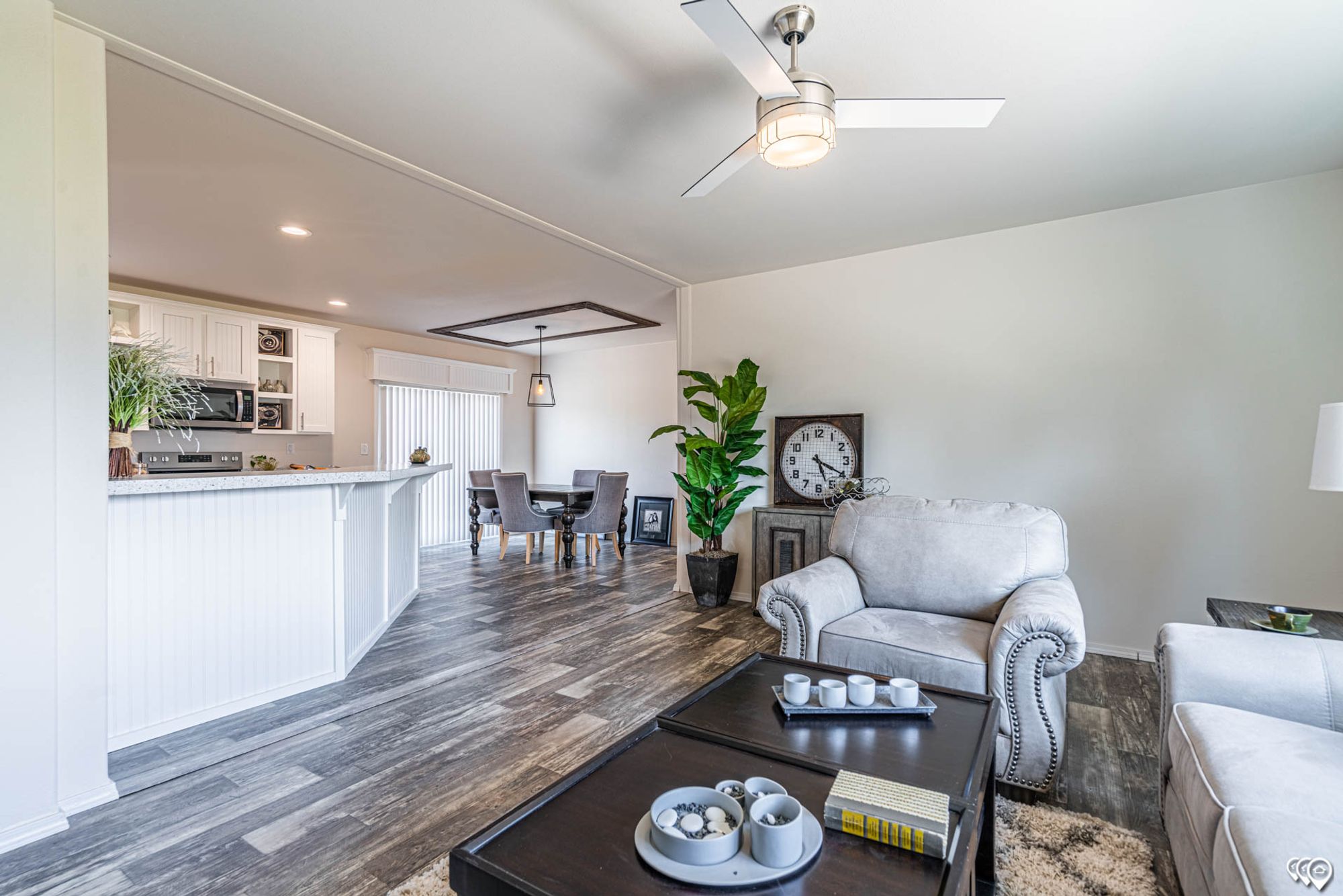 Open-concept front room, kitchen, and dining room.