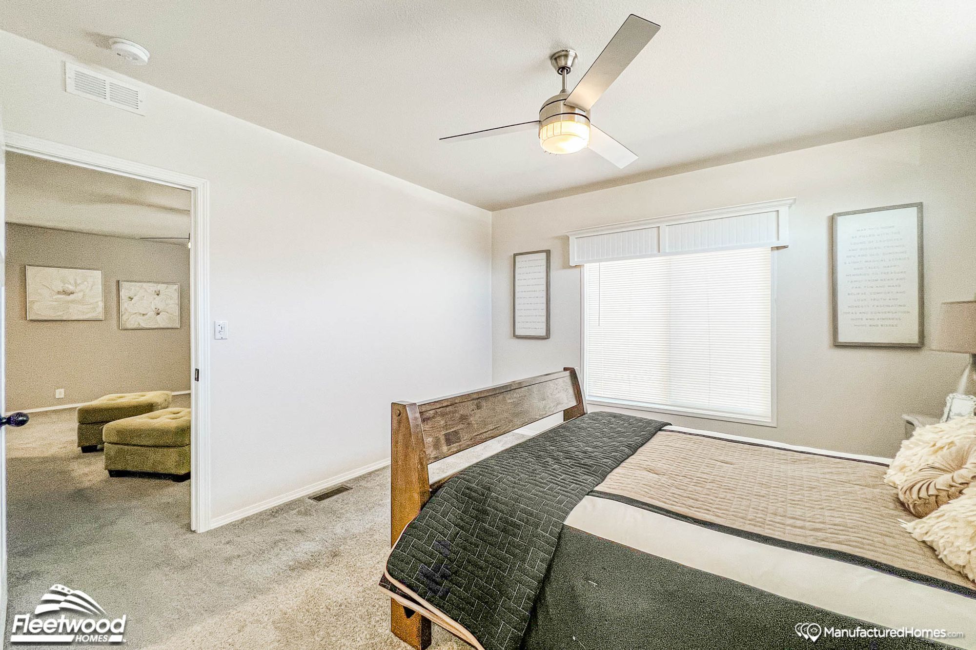 Mid-sized bedroom with two bedside tables.