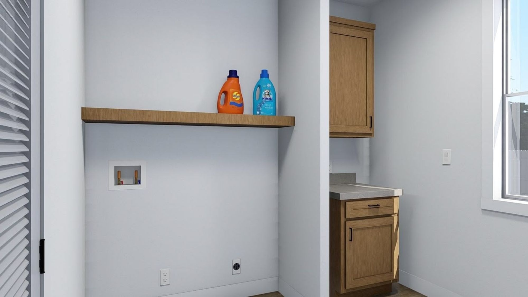 Laundry room with washer and dryer hookups.