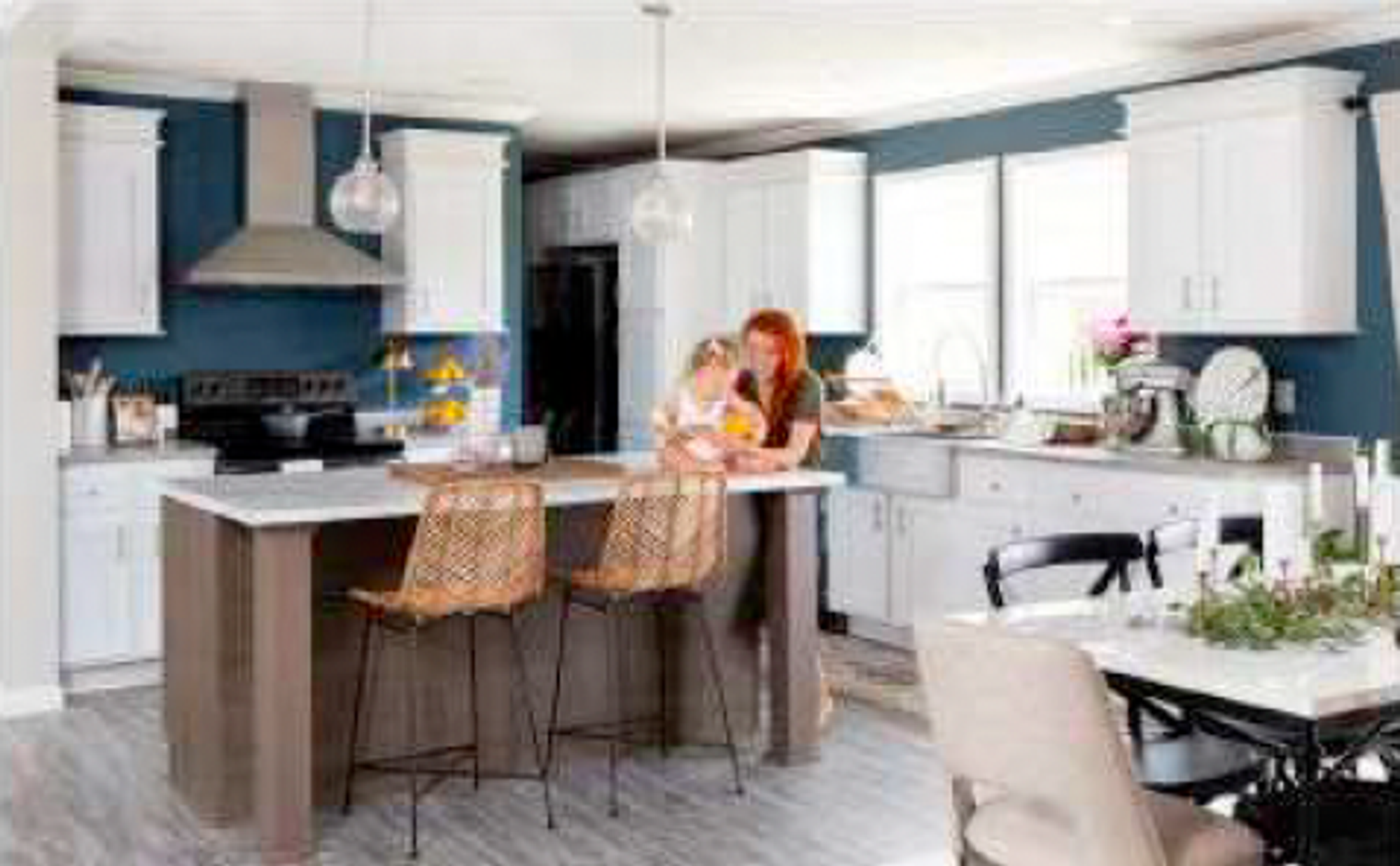 Modern kitchen with blue walls and white cabinets