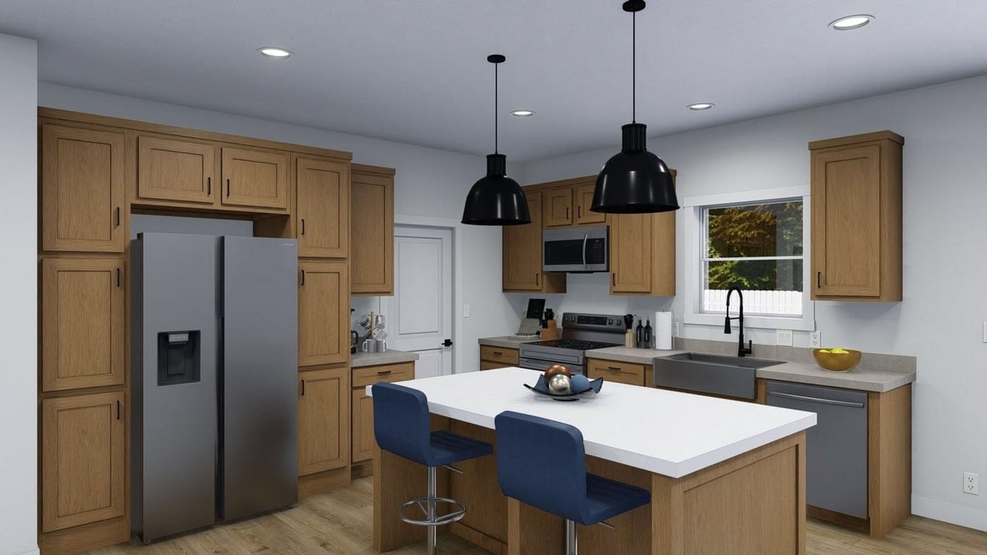 Large kitchen with an island, white countertops, a farmhouse-style sink, and silver appliances.