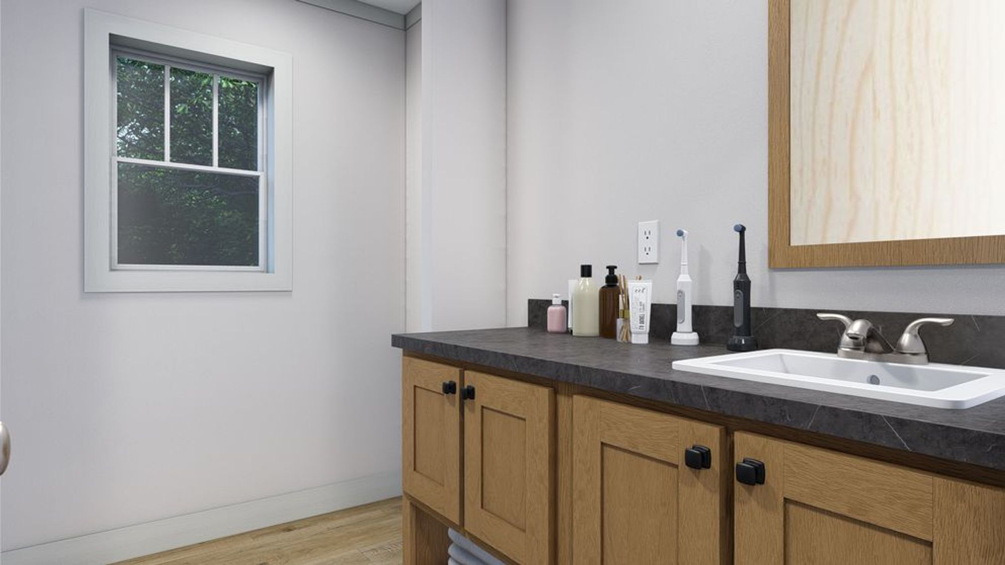 Close-up of a bathroom with a spacious sing-sink countertop.