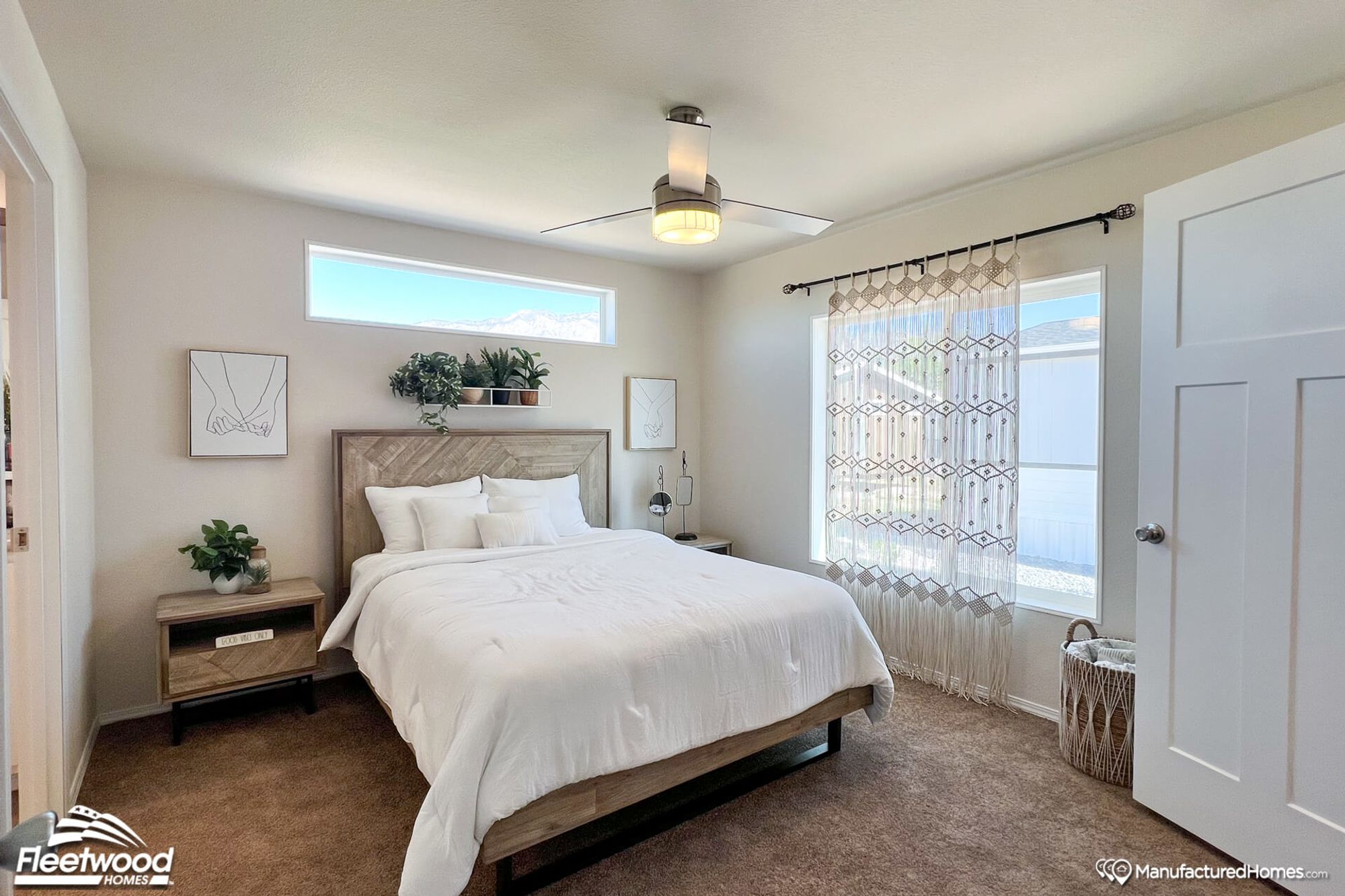Mid-sized bedroom with two bedside tables.