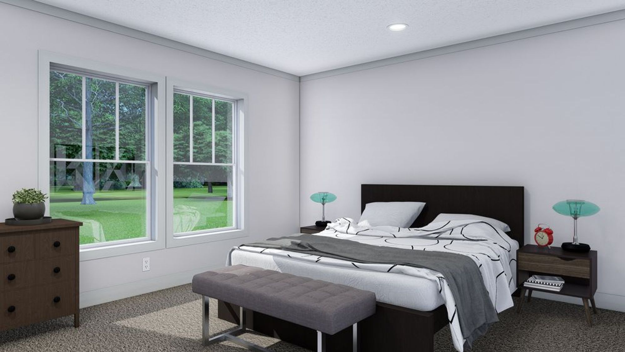 Mid-sized bedroom with a king bed and two bedside tables.