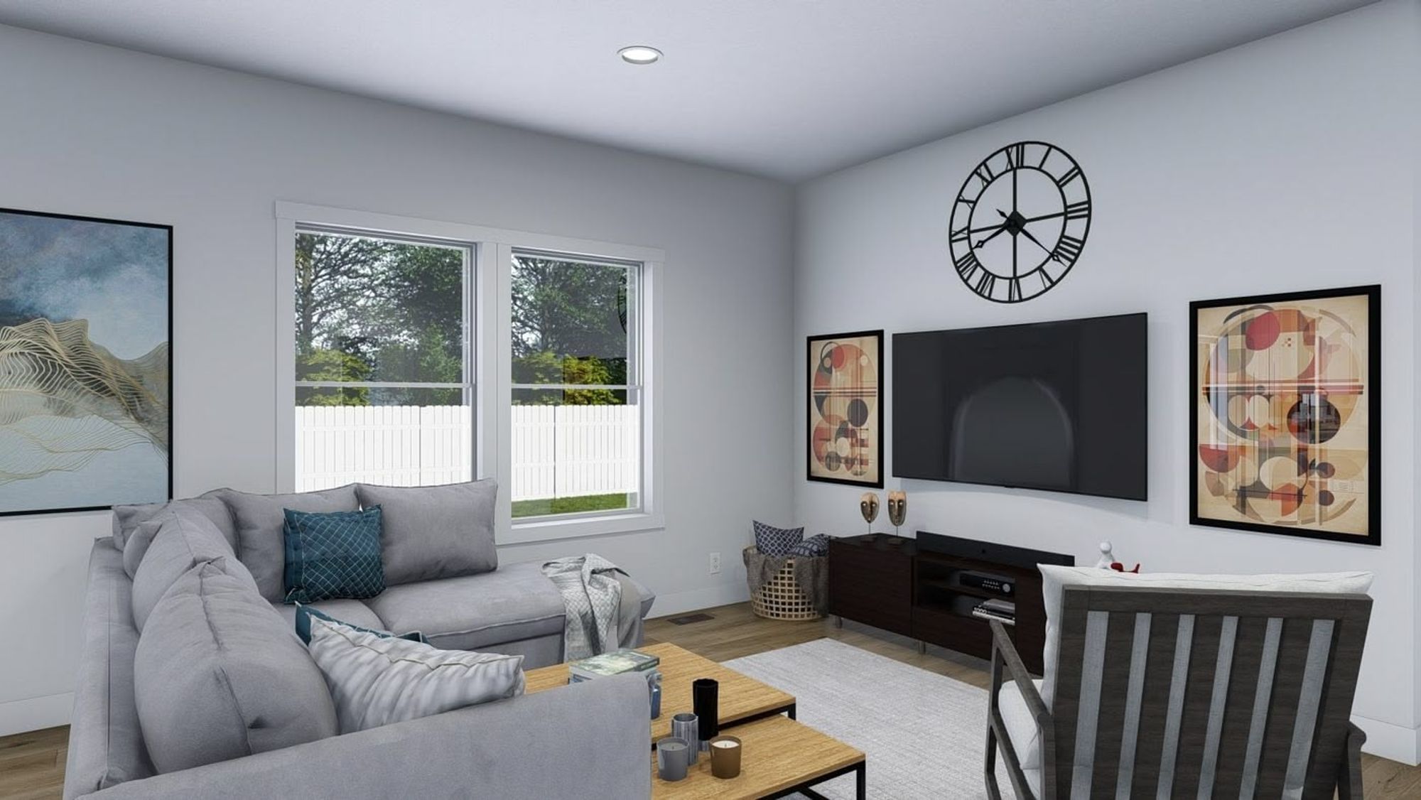 Large living room that fits an entertainment center, a TV, coffee table, ottoman, side tables, and an L-shaped couch.