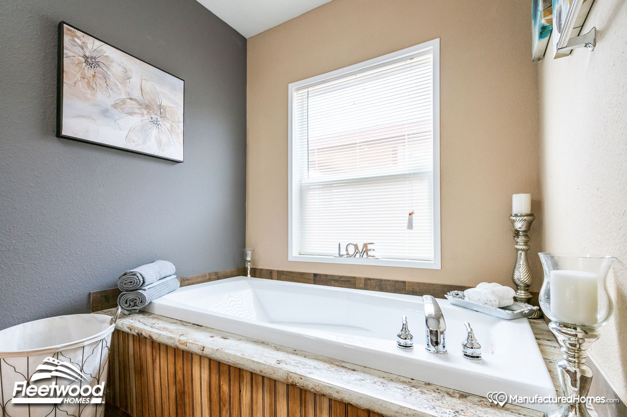 Close-up of a bathroom with a large bathtub.