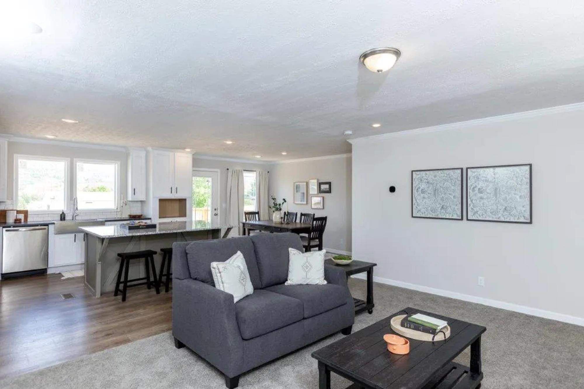 Open concept living room, dining room, and kitchen