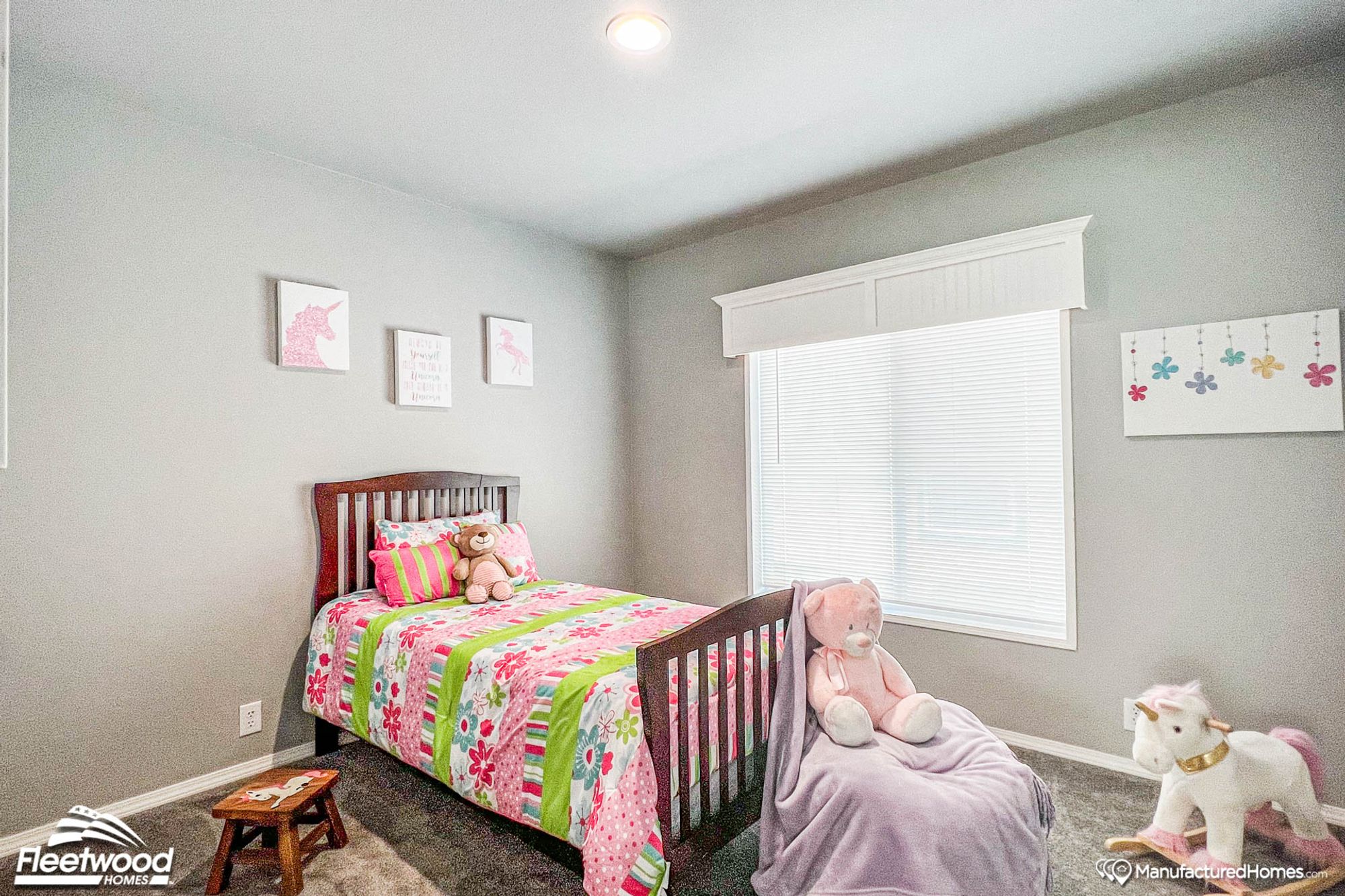 Mid-sized child's bedroom with a twin bed