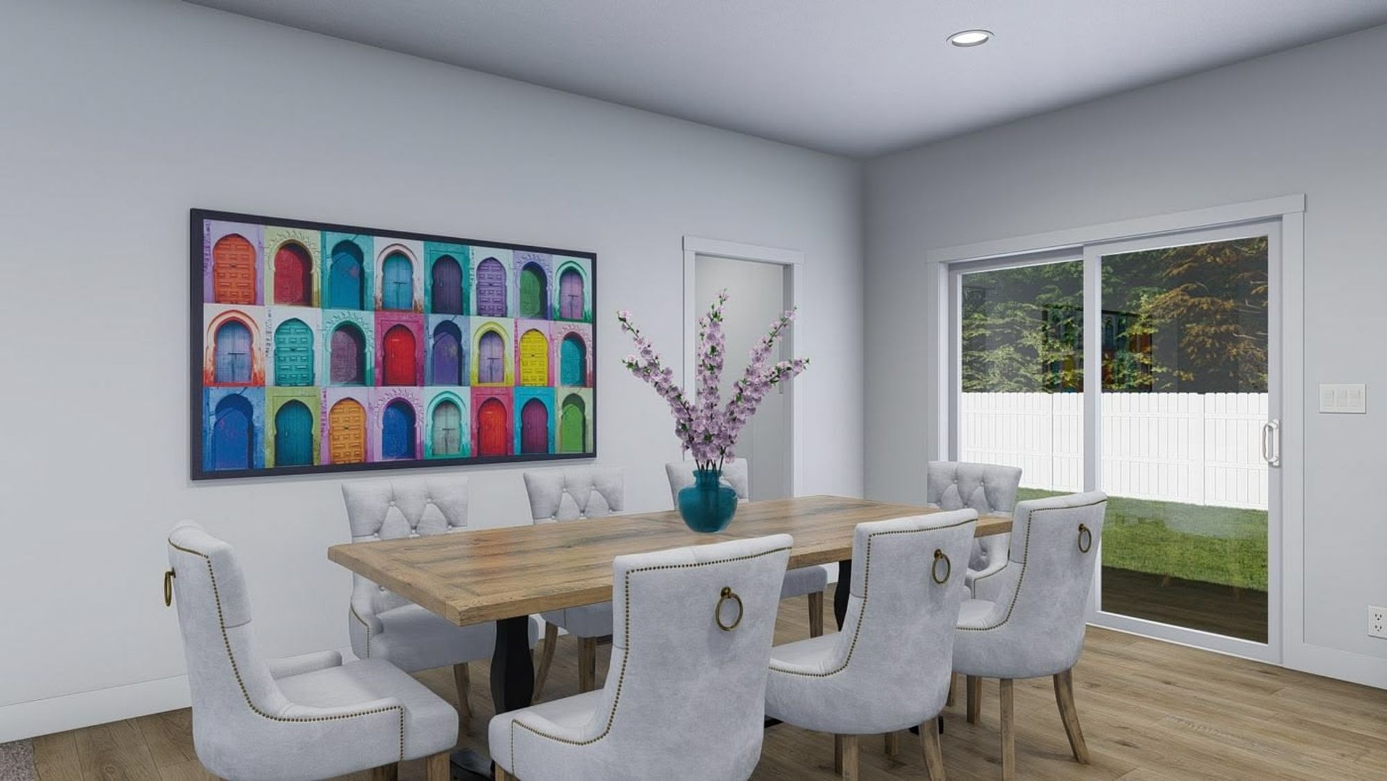 Dining room with a table that seats 8 people and a sliding glass door.
