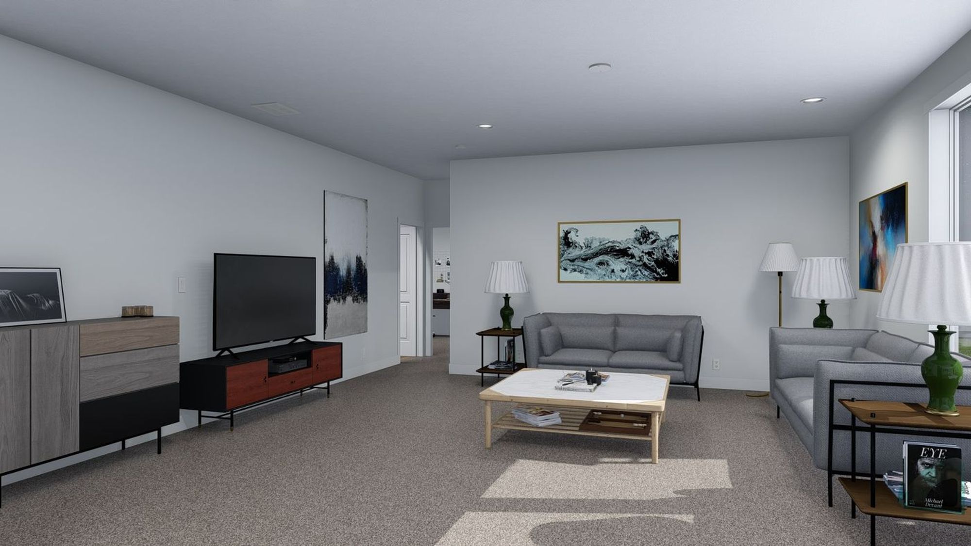 Large living room with two couches, a coffee table, and an entertainment center.
