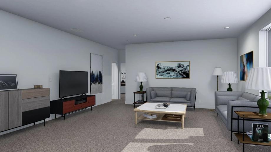 Large living room with two couches, a coffee table, and an entertainment center.