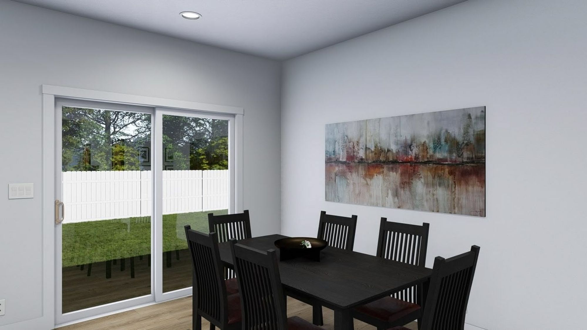 Dining room with a black table that seats 6 people.
