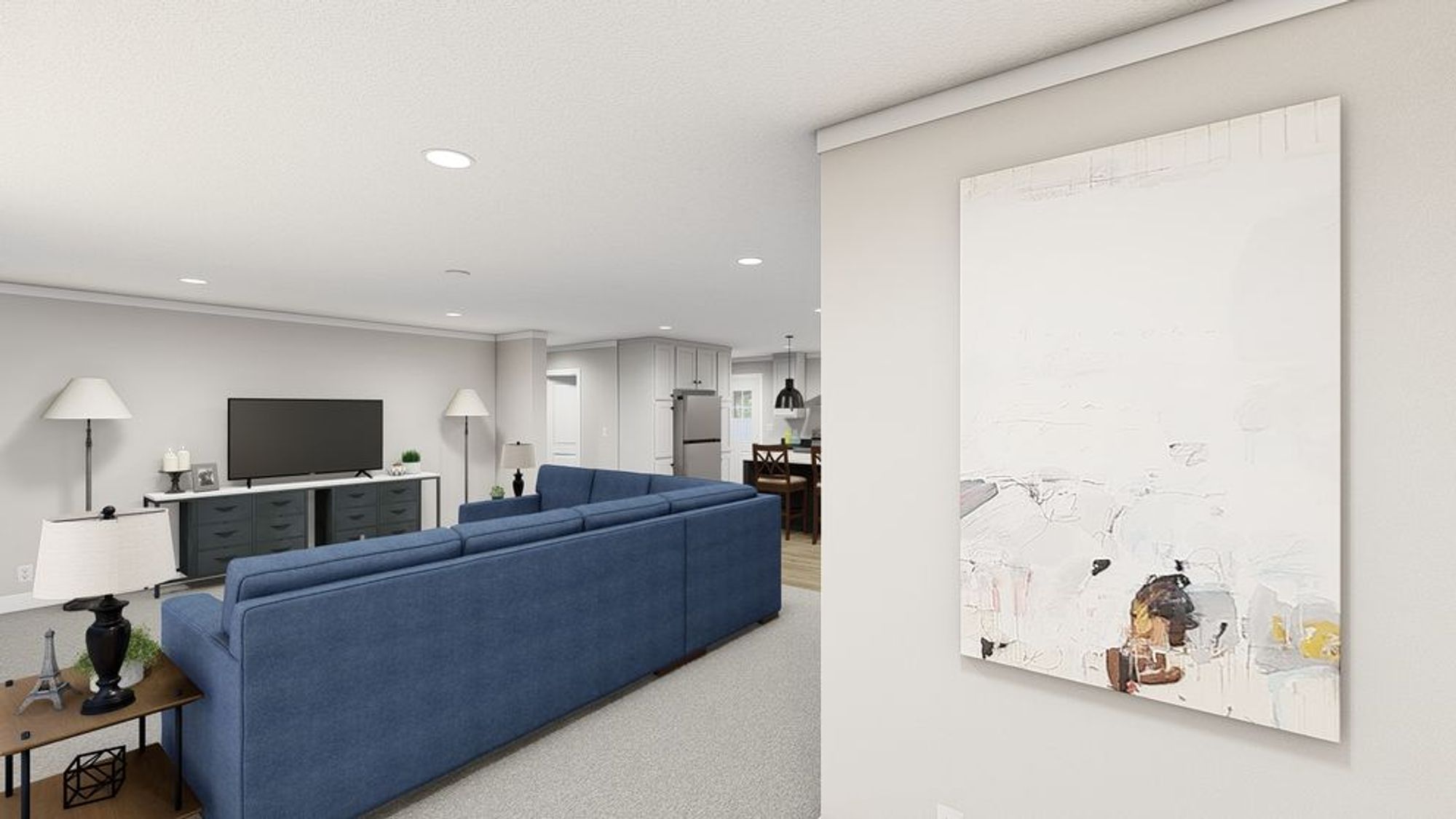 Partial view of large front room with a sectional couch