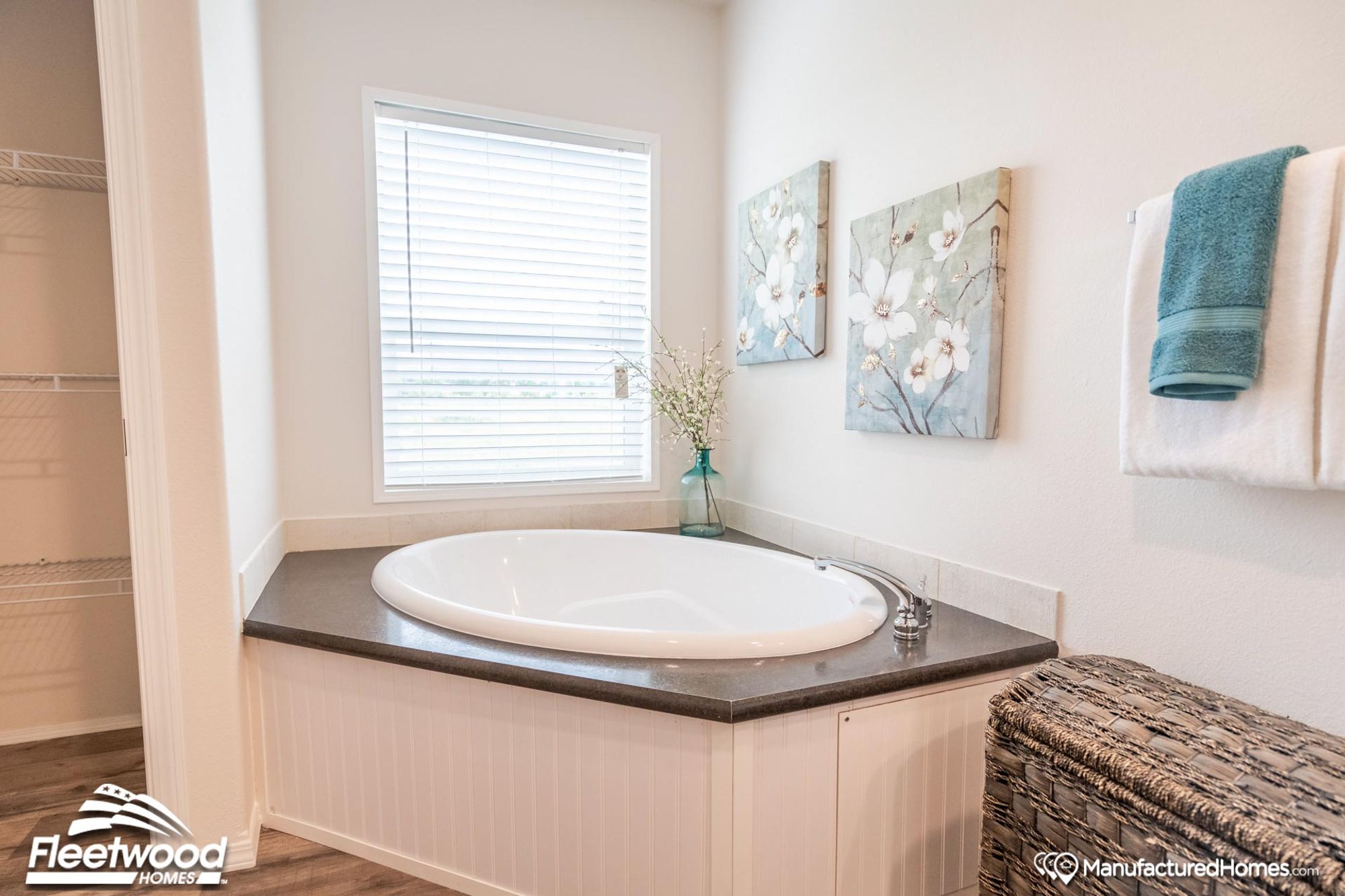 Partial view of the bathroom with a large bathtub