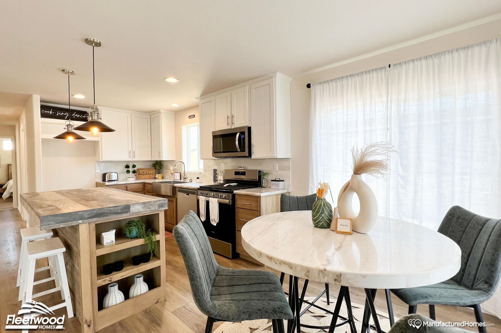 Open concept kitchen and dining room.