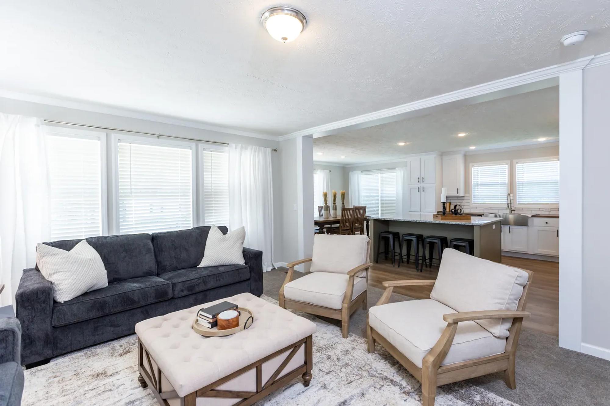 Partially open-concept living room, kitchen, and dining room