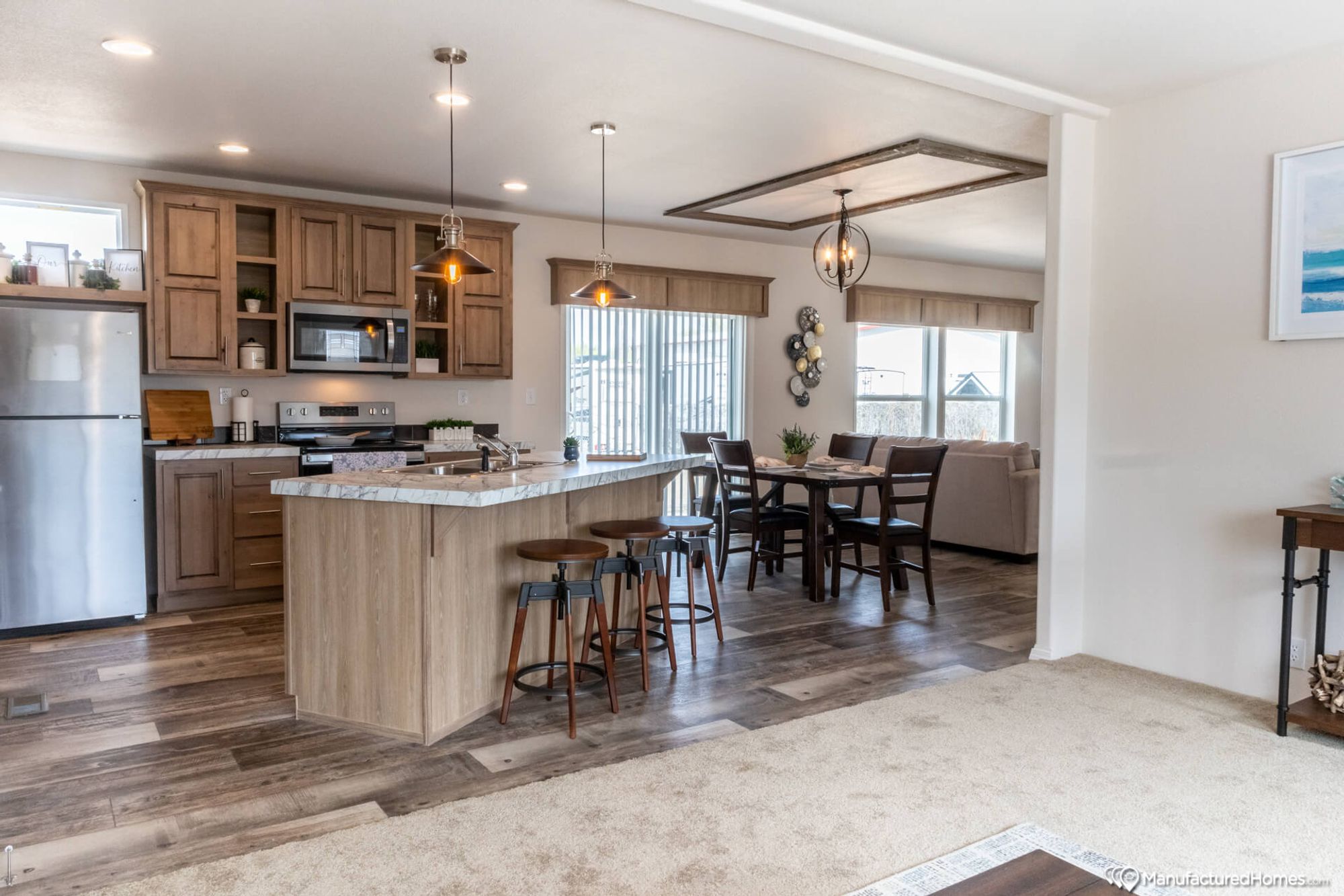 Open concept kitchen, dining room, and living room.