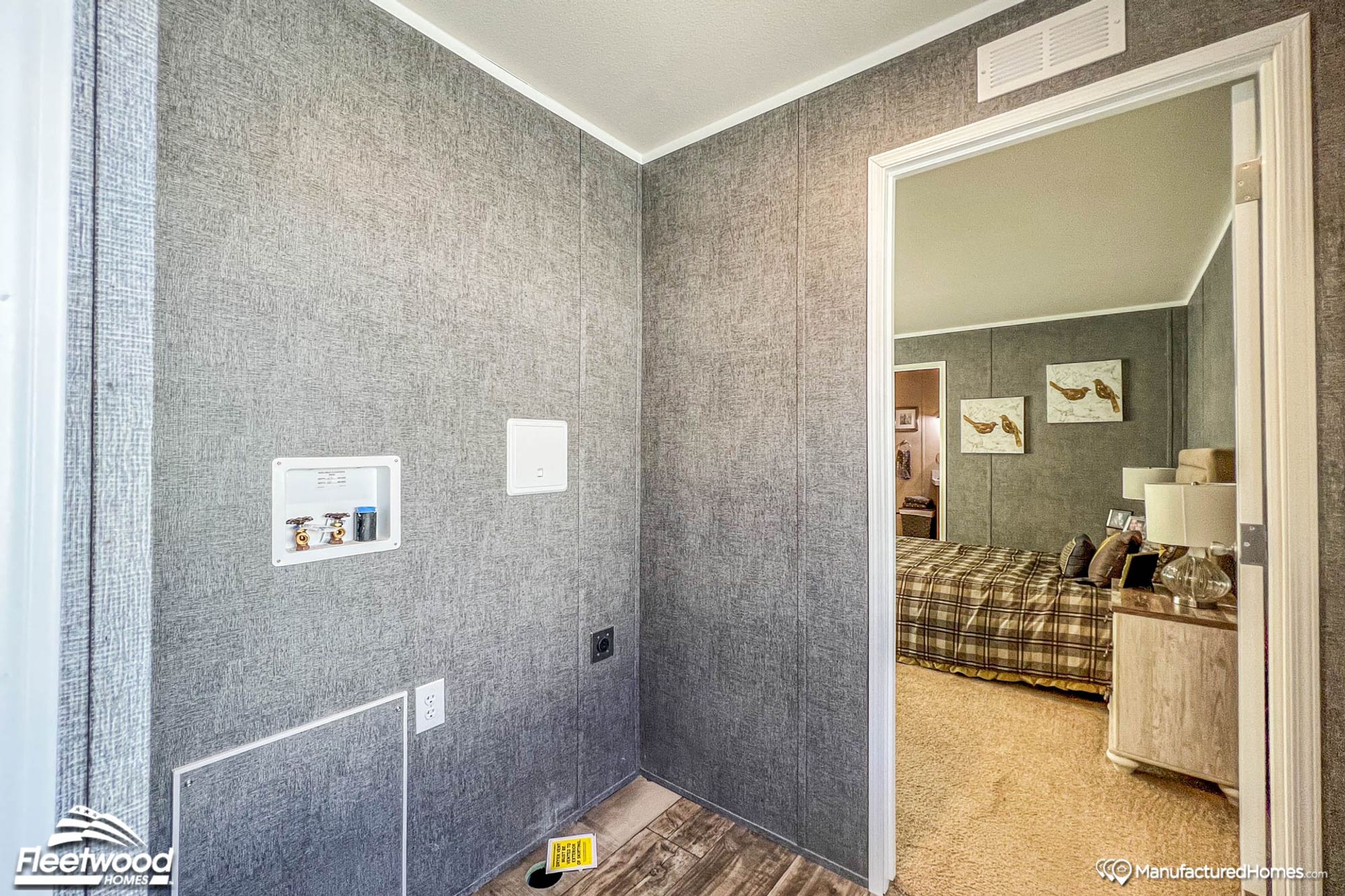 Laundry room with hook-ups.