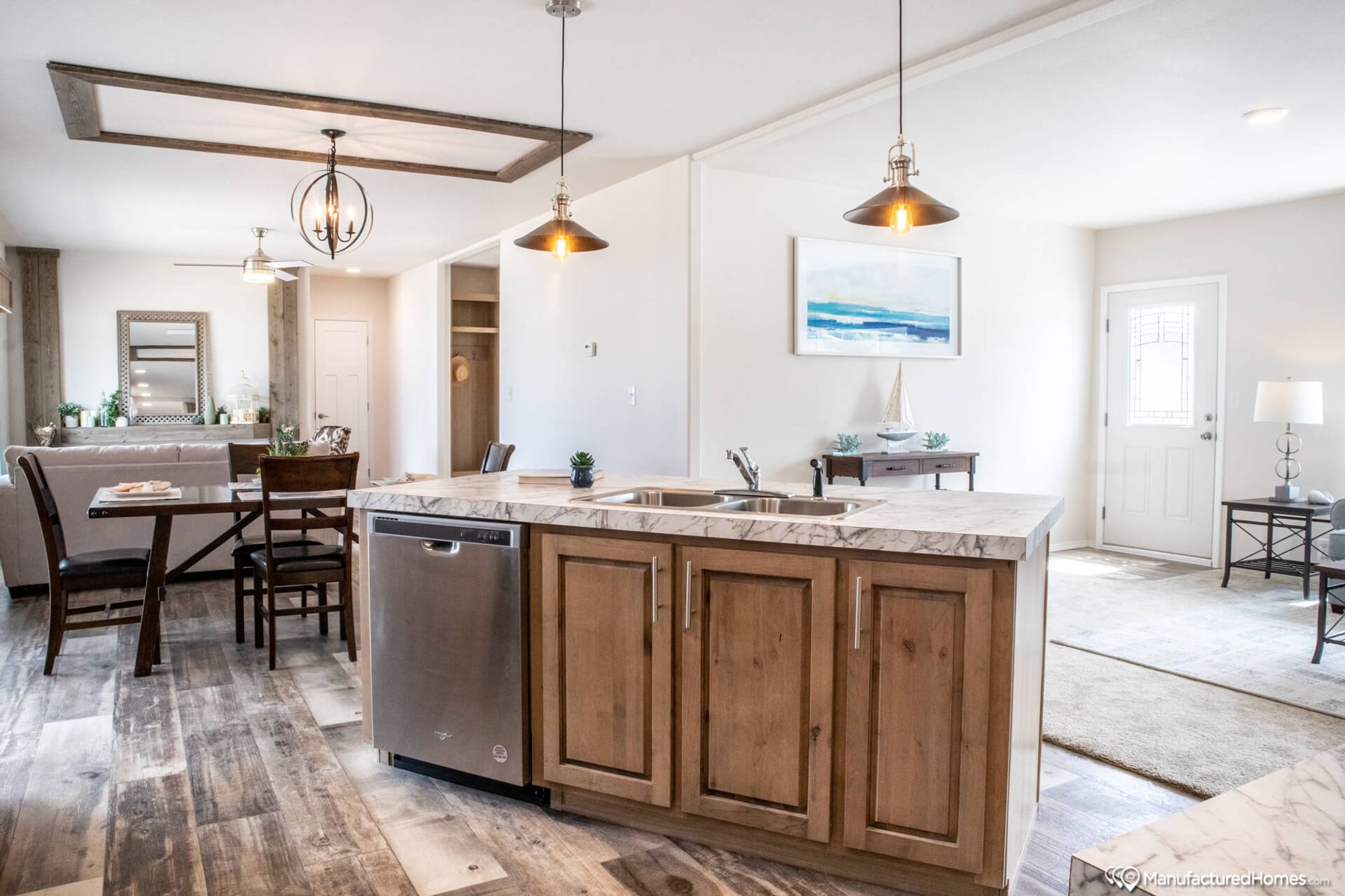 Open concept kitchen, dining room, and living room.