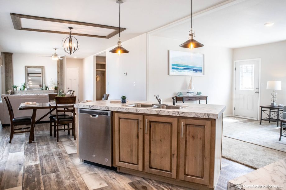 Open concept kitchen, dining room, and living room.