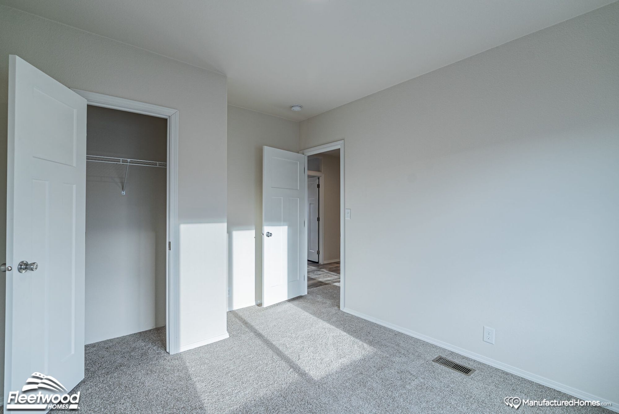 Mid-sized empty bedroom