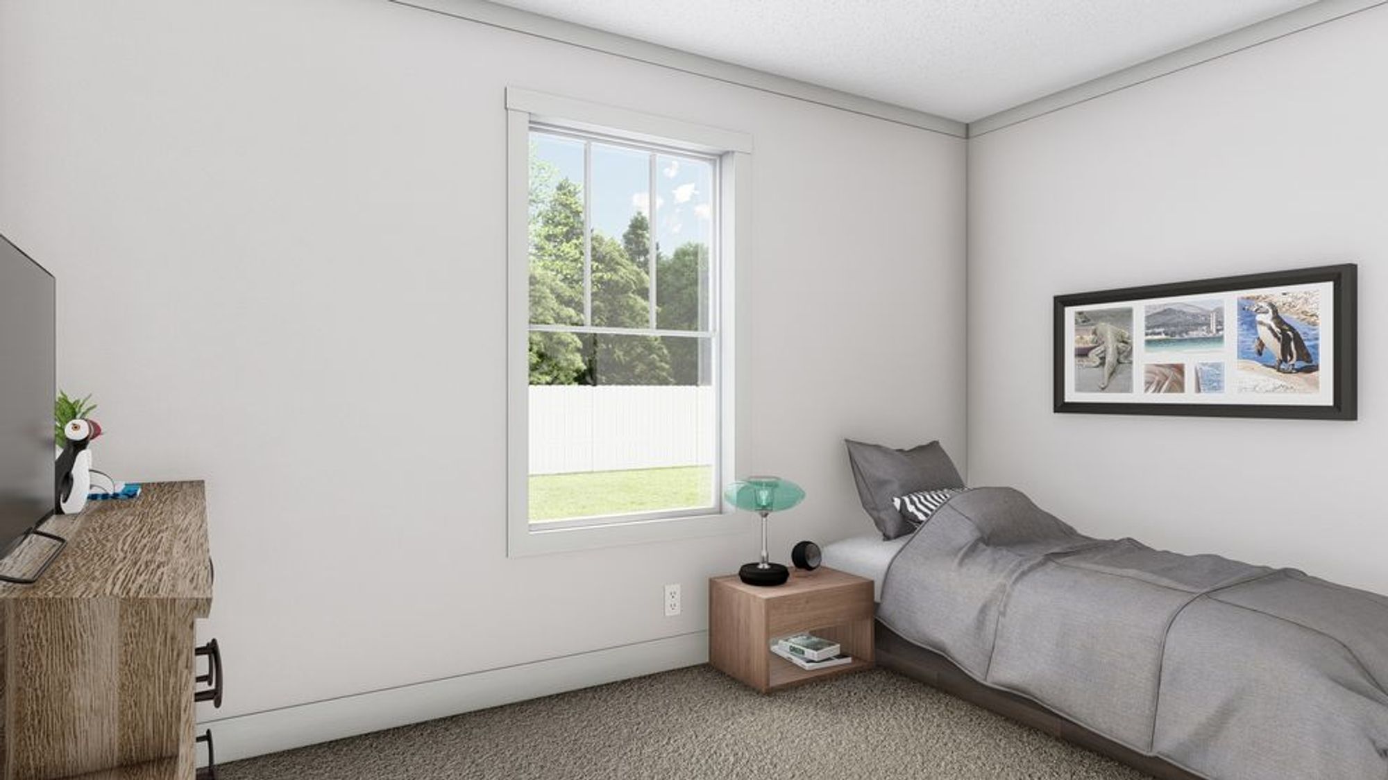 Minimalist bedroom with gray bedding, woven nightstand, framed nature photography collage, and large window overlooking green yard with white fence.