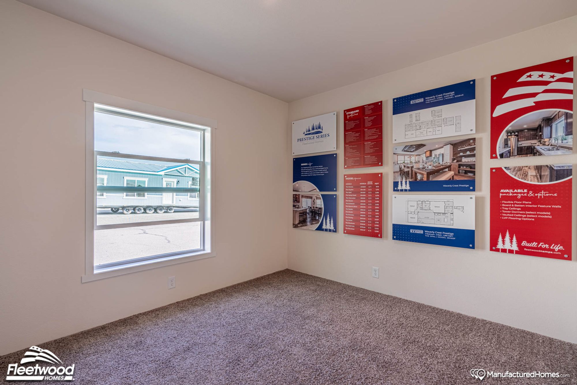 Empty small room with mockup posters on the wall.