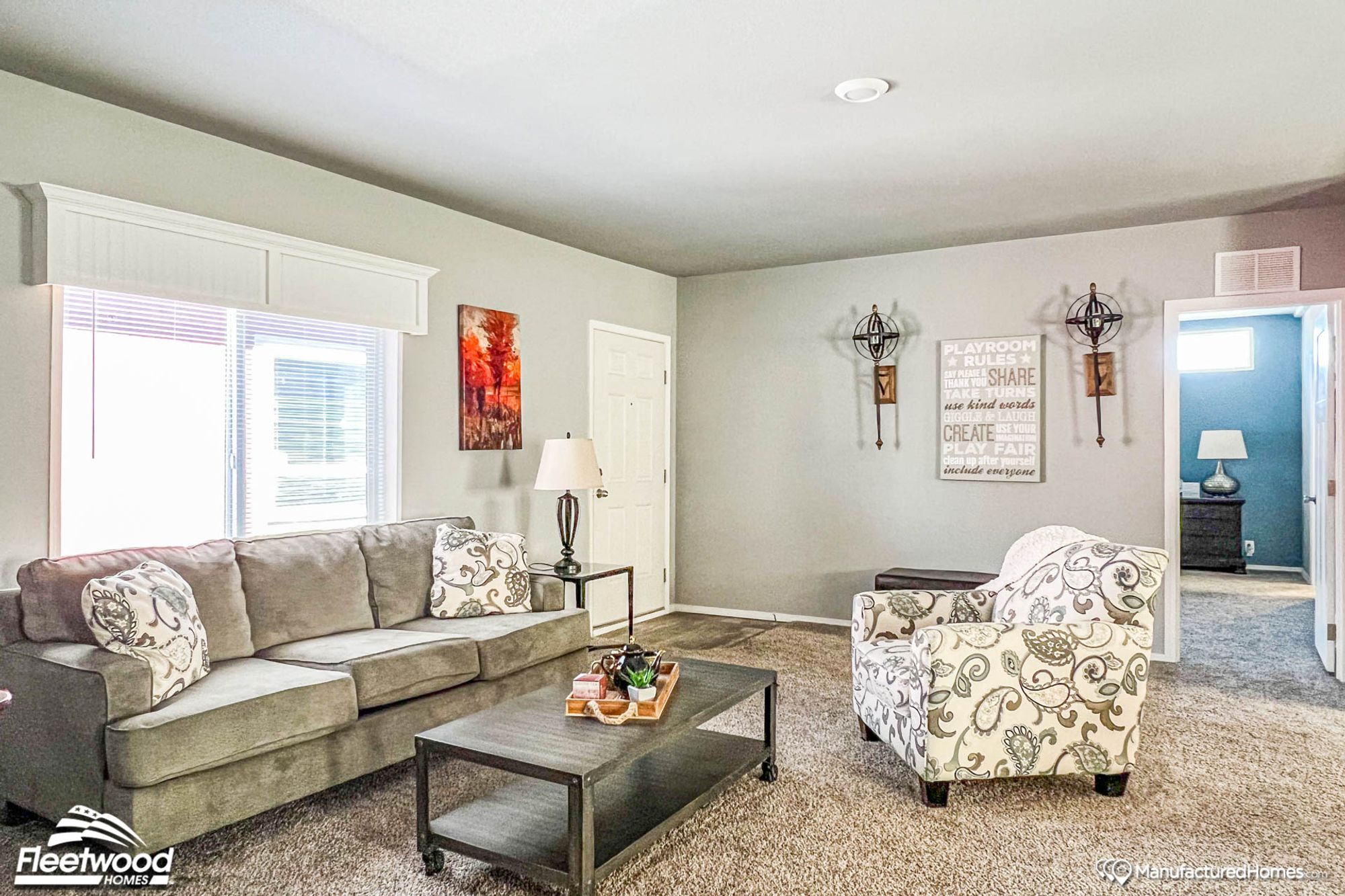 Mid-sized living room with a couch, a chair, and a coffee table.