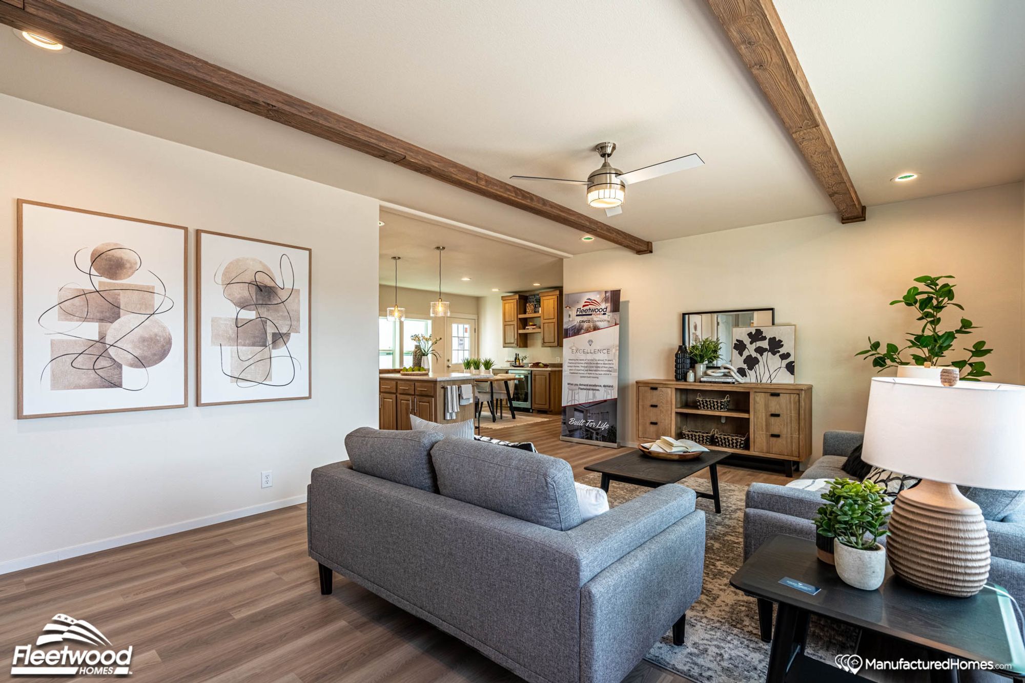 Large living room with two couches and a coffee table.