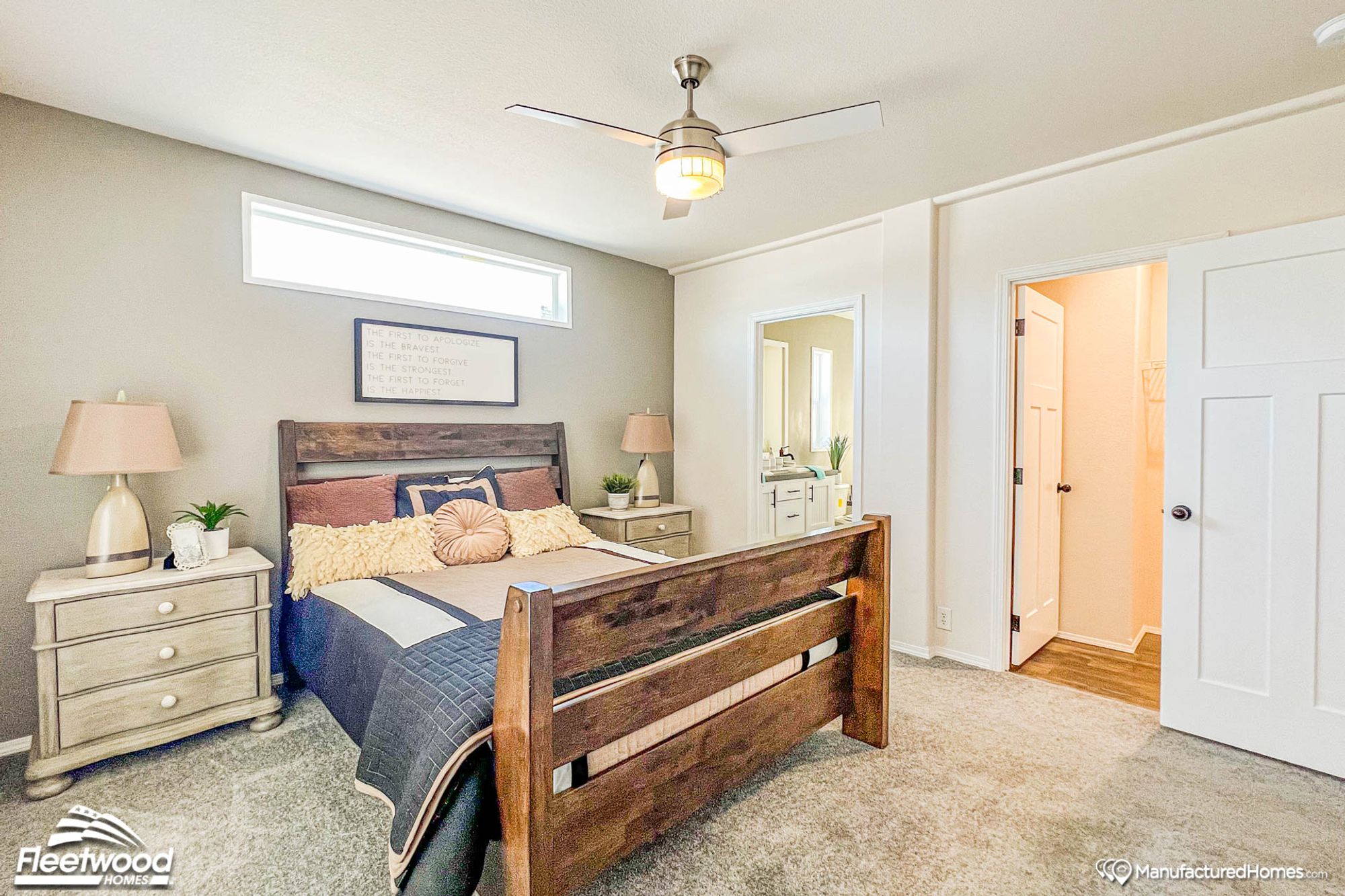 Mid-sized bedroom with two bedside tables.
