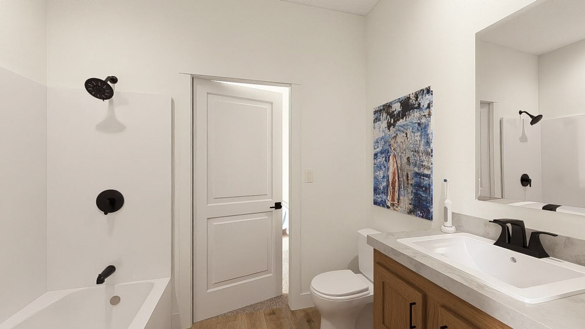 Medium-sized bathroom with a single sink and a bathtub.