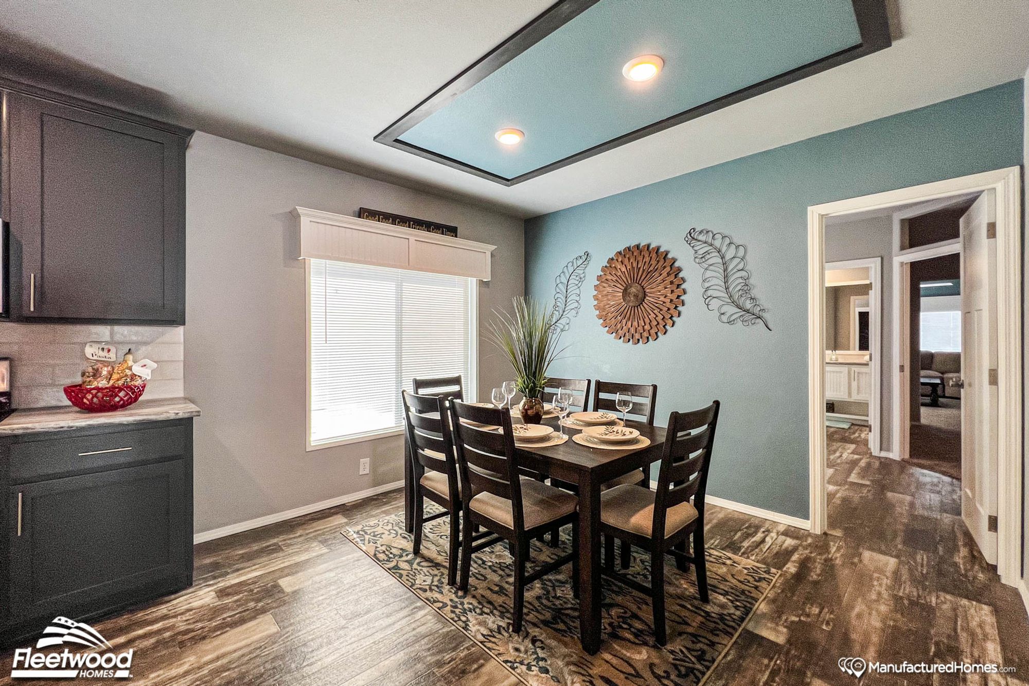 Dining area with a table that seats 6.