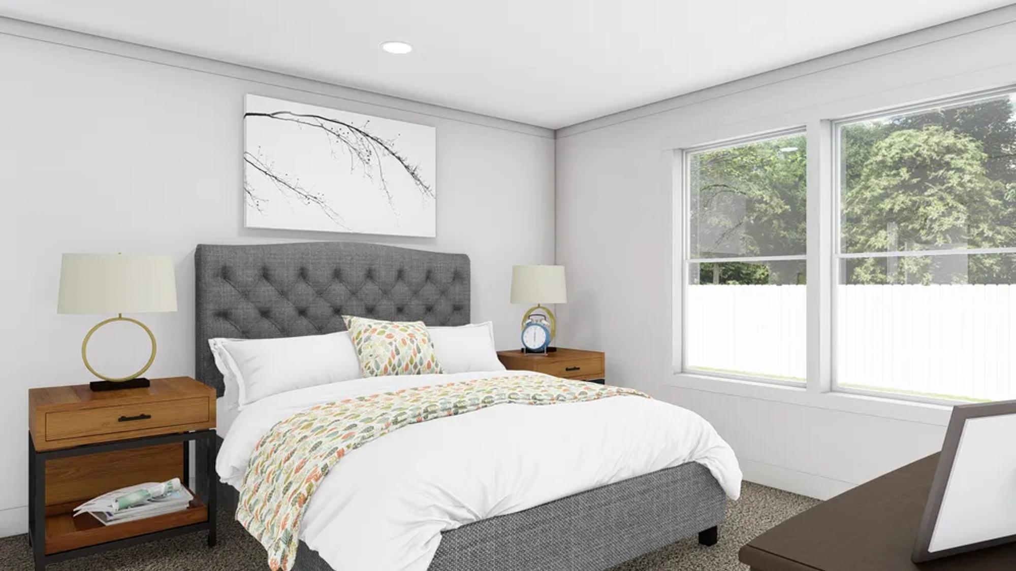 Mid-sized bedroom with a queen bed and two bedside tables.