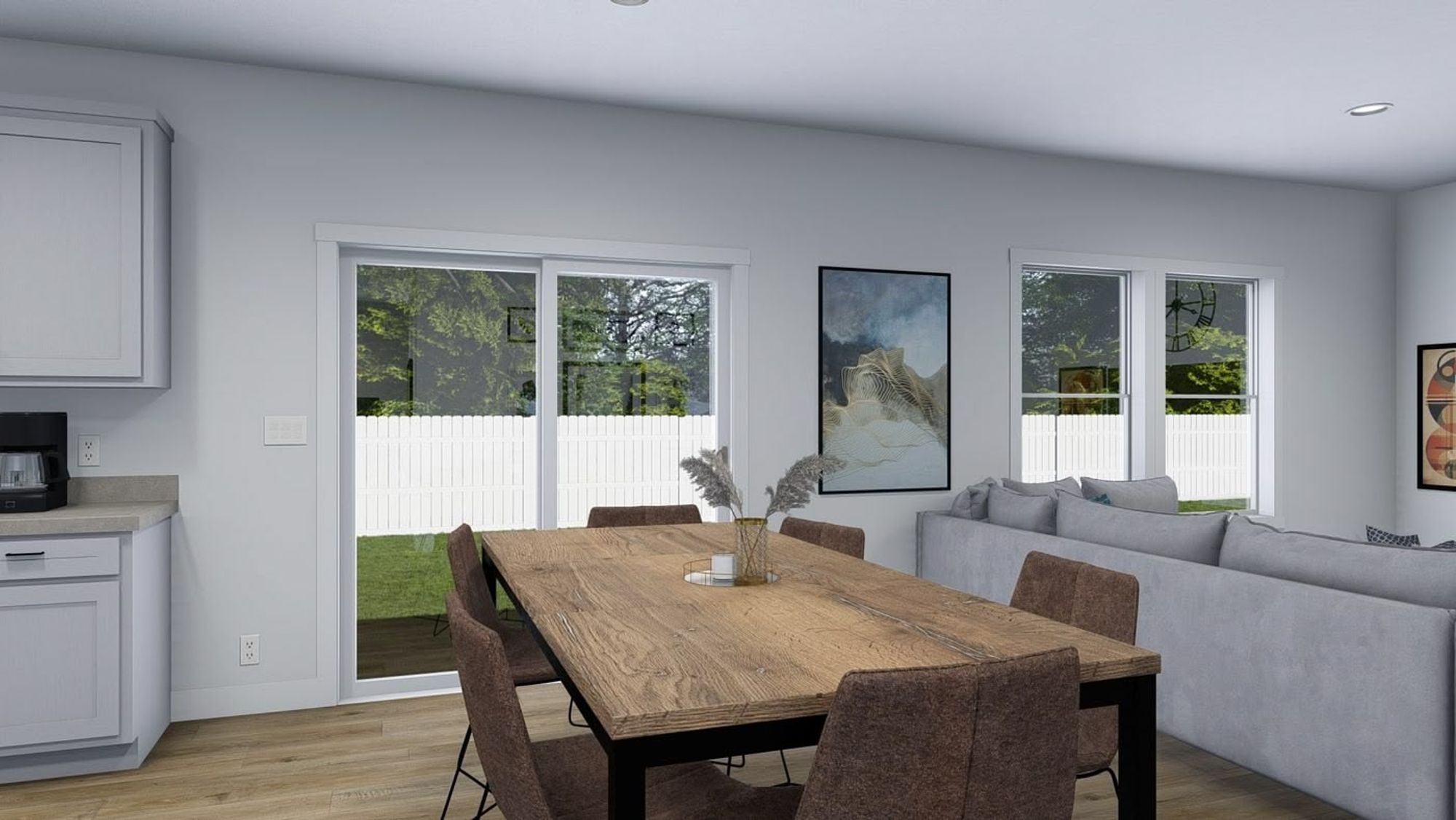 A dining room that is part of an open-layout house.