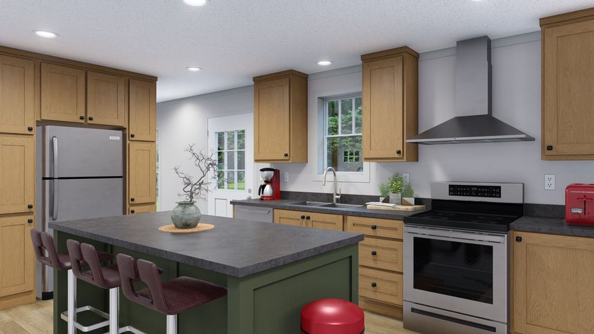 Large kitchen with a mix of light and medium warm wood cabinetry, and grey countertops.