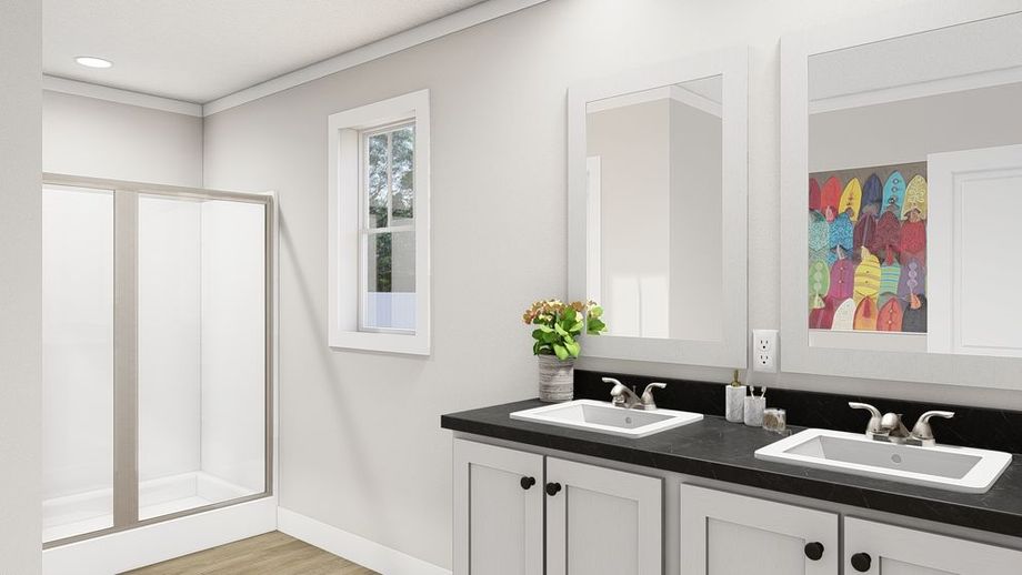 White bathroom with double sink and black countertop
