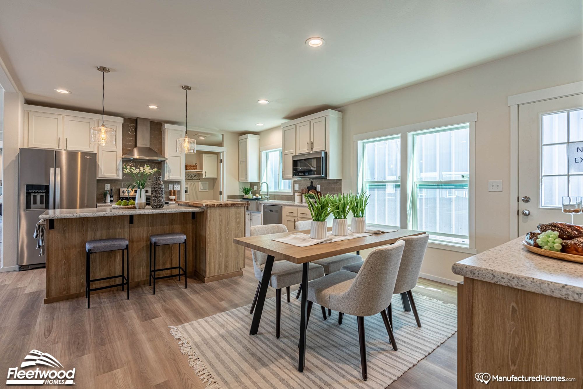 Large kitchen and dinning room area.