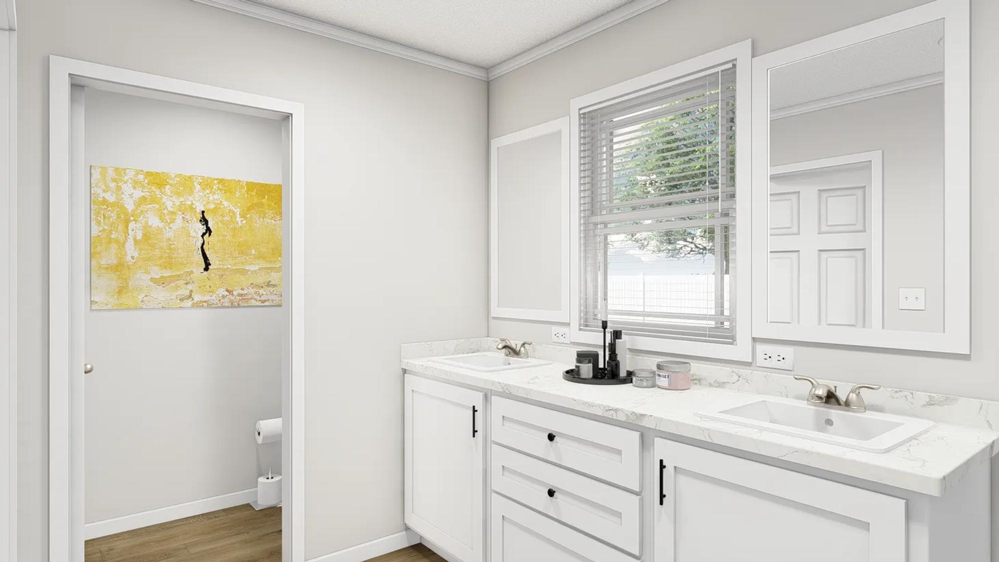 Clean white bathroom with double sink, showing a doorway leading to a room with the toilet