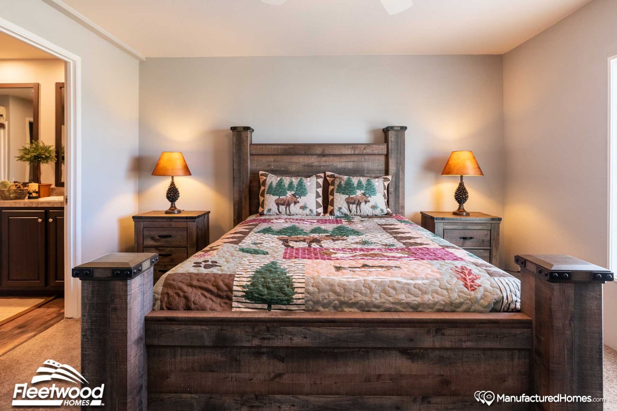Mid-sized bedroom with a full bed and two bedside tables.