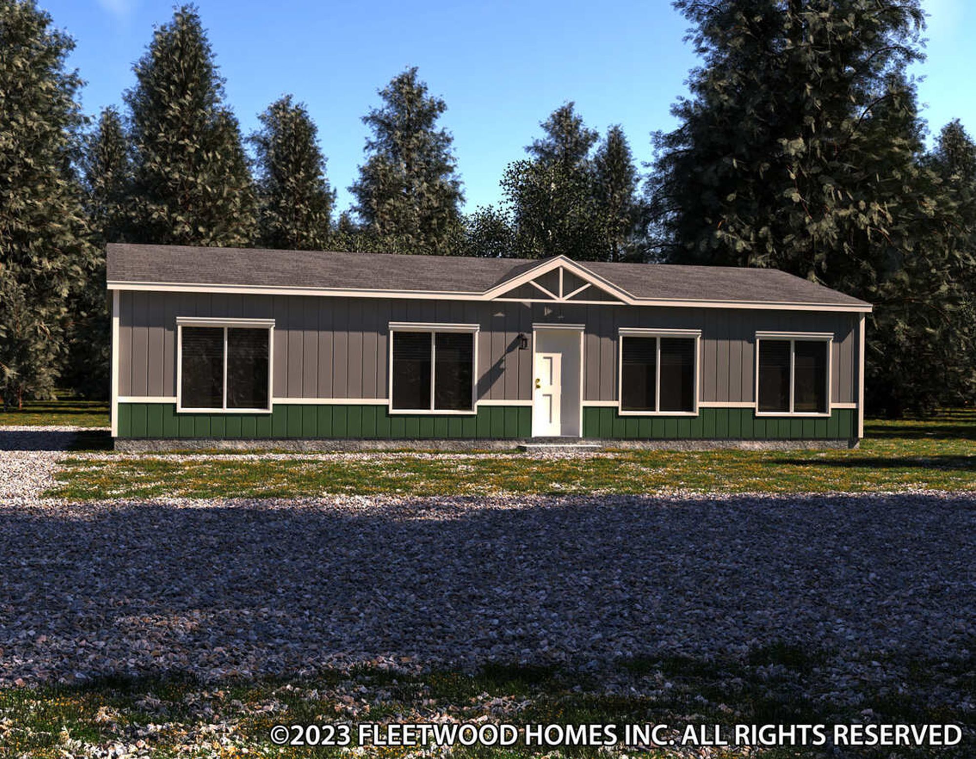 Single-story manufactured home with blue siding, dark trim accents, a white front door, and three large front windows, set on a grassy lot with trees in the background.