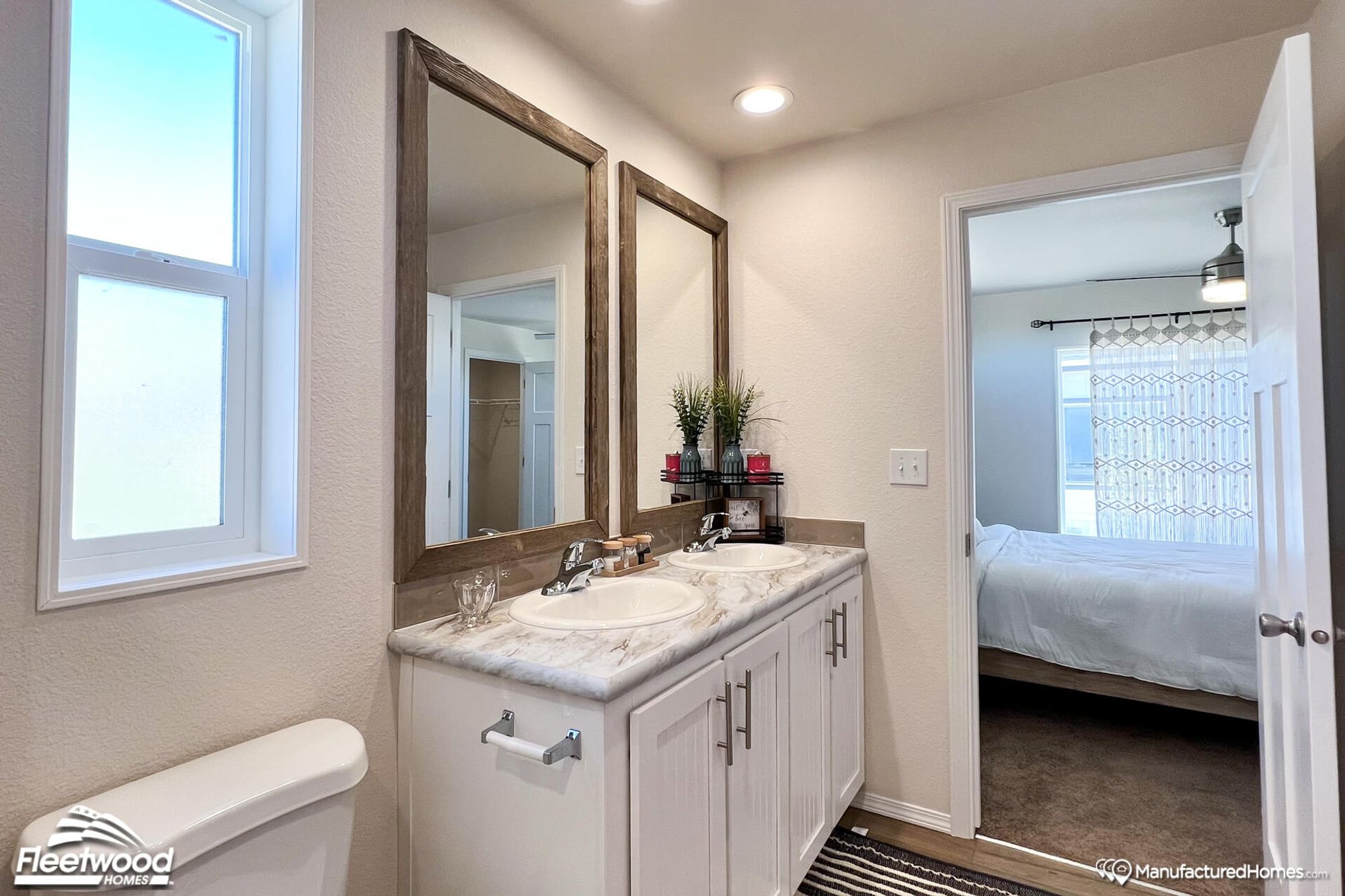 Close-up of a bathroom with a spacious double-sink countertop.