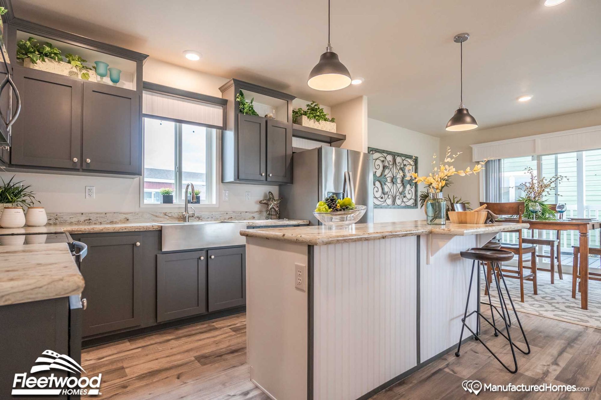 Large kitchen and dinning room with a large island.