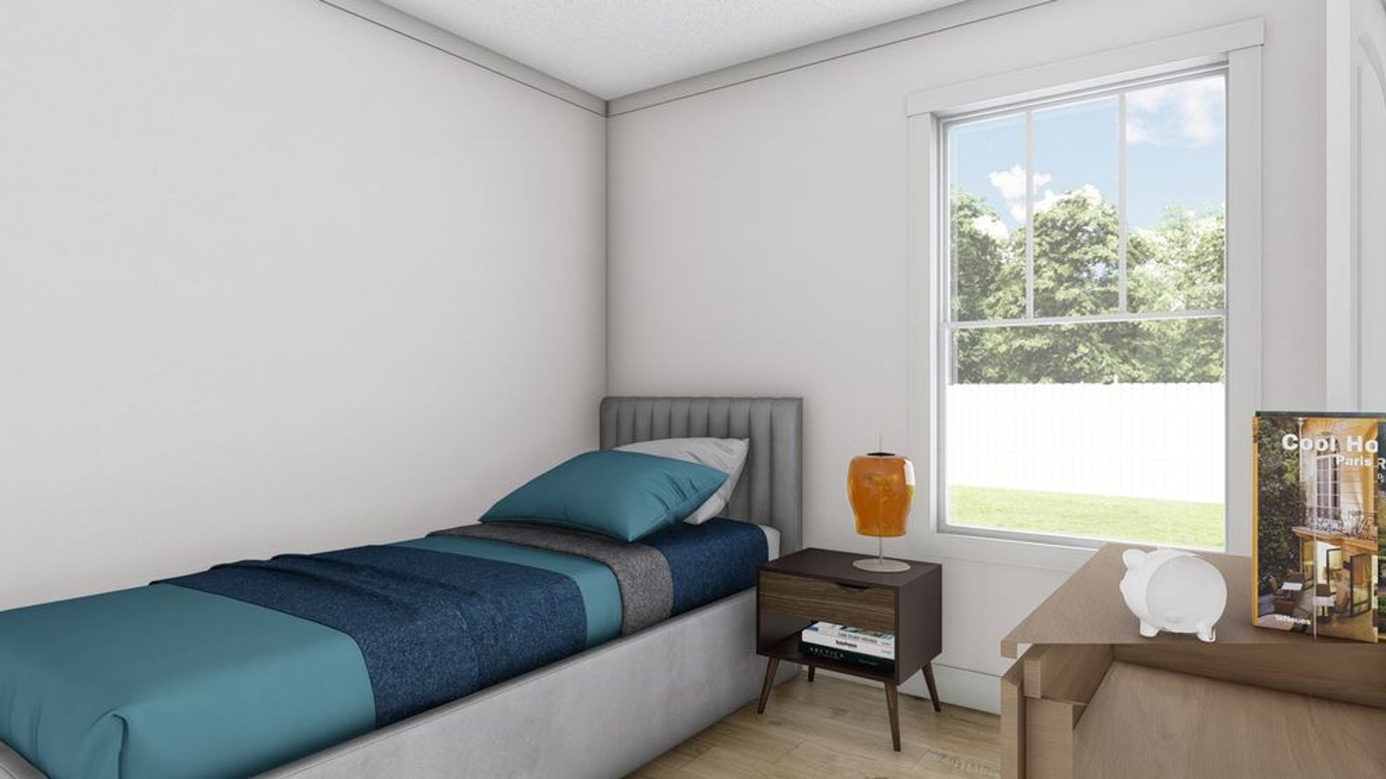Simple twin bedroom with gray upholstered headboard, teal and navy bedding, mid-century nightstand, and ceramic accent pieces by bright window.