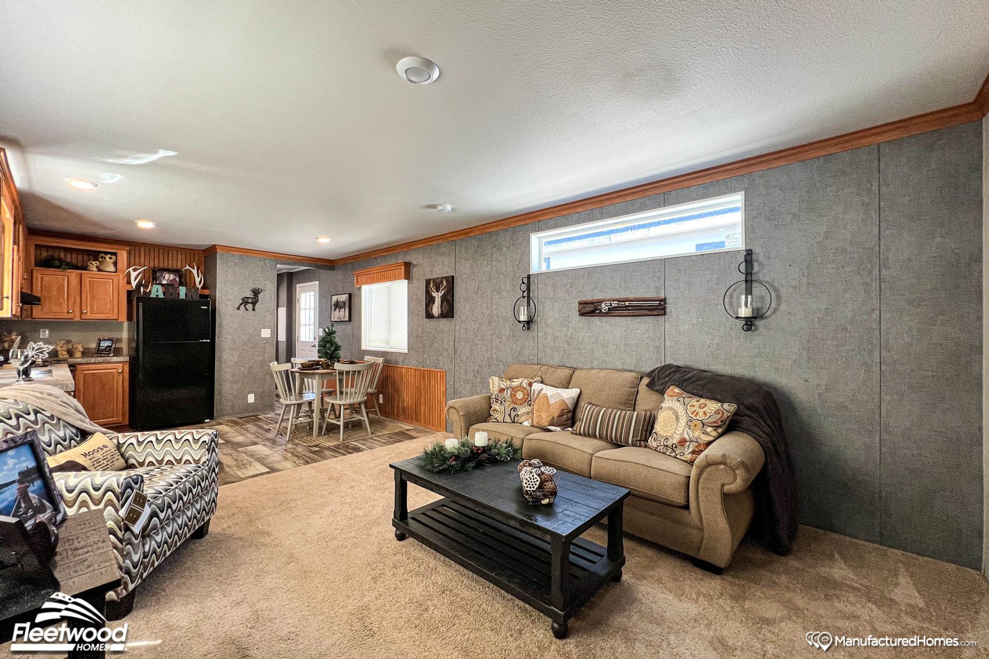 Mid-sized living room with a couch, chair, and coffee table.