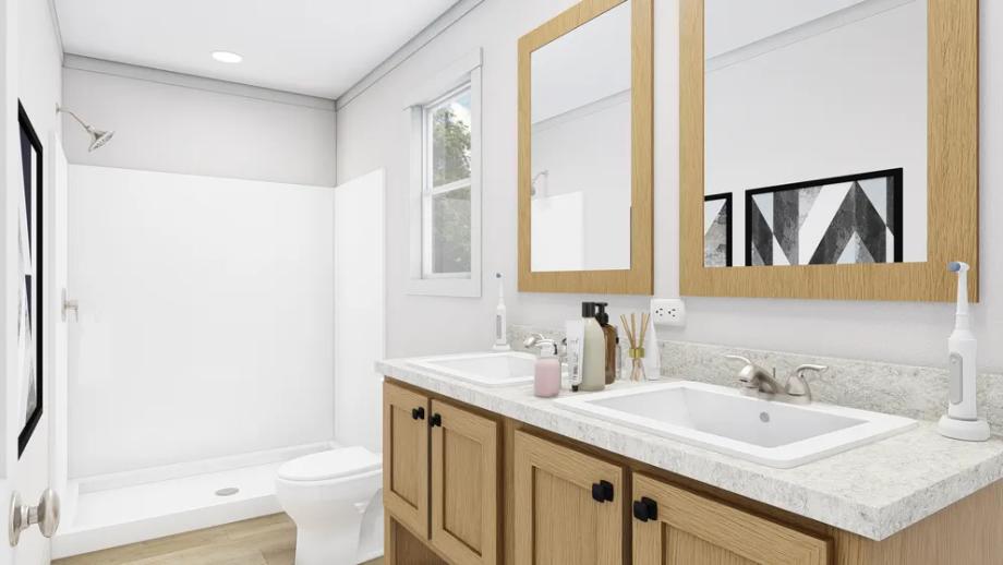 Close-up of a bathroom with a spacious double-sink countertop.