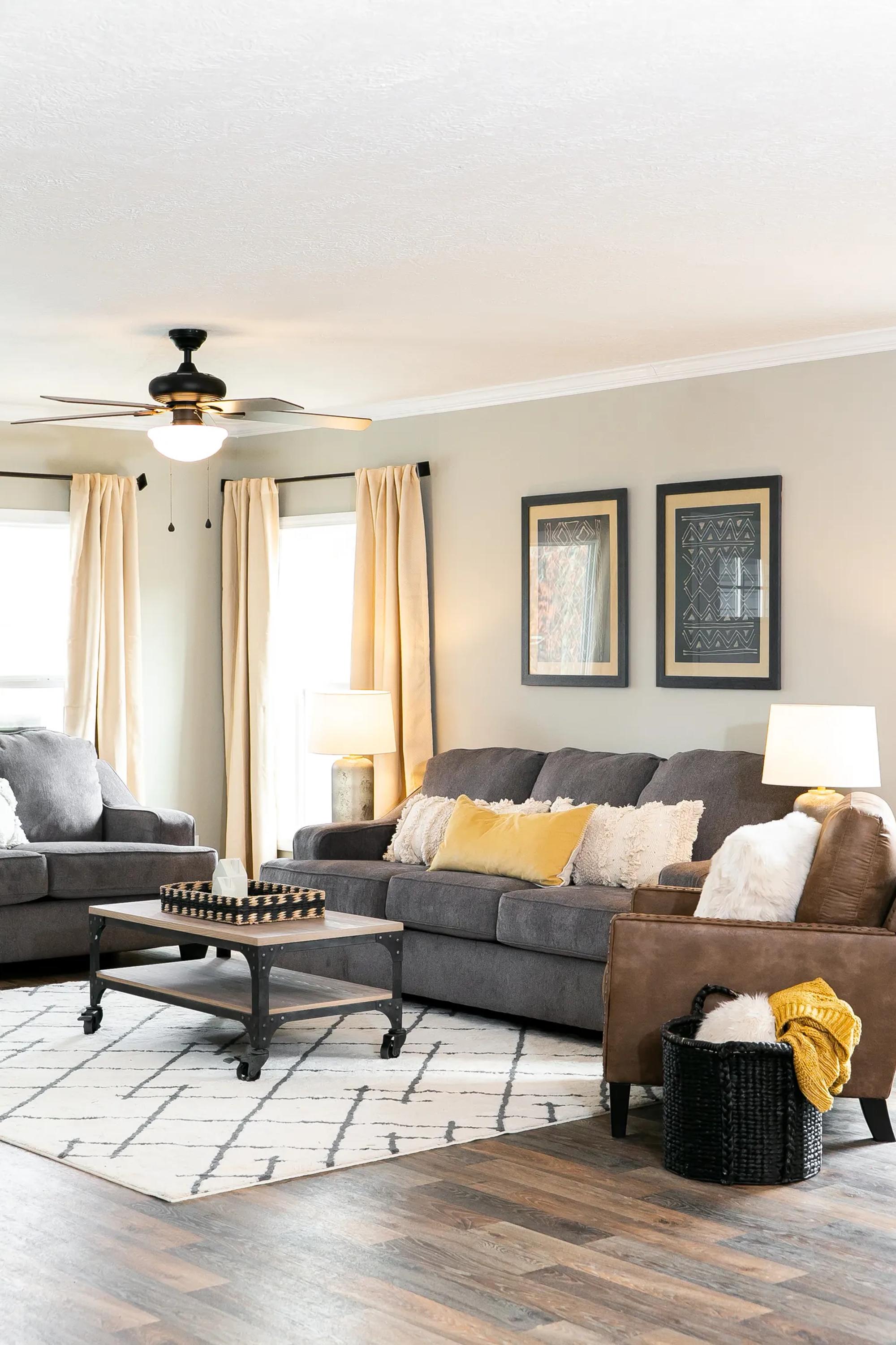 Large living room with a couch, chair, and loveseat