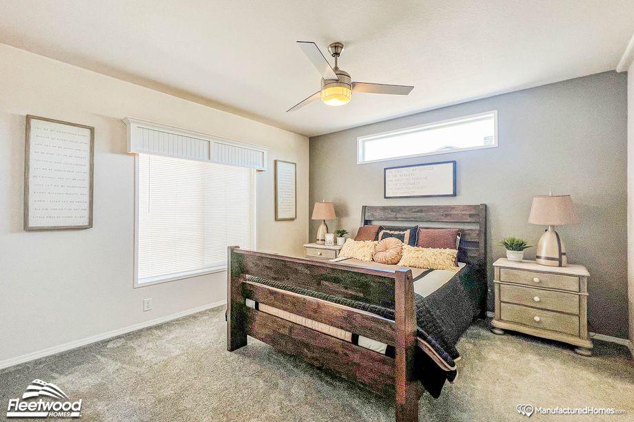 Mid-sized bedroom with two bedside tables.
