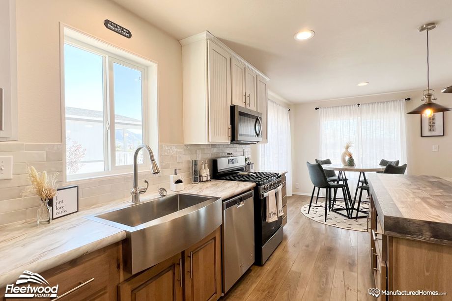 Open concept kitchen and dining room.